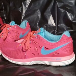 Women size 9.5 nike running shoes dual fusion lite pink blue tennis sneaker mesh